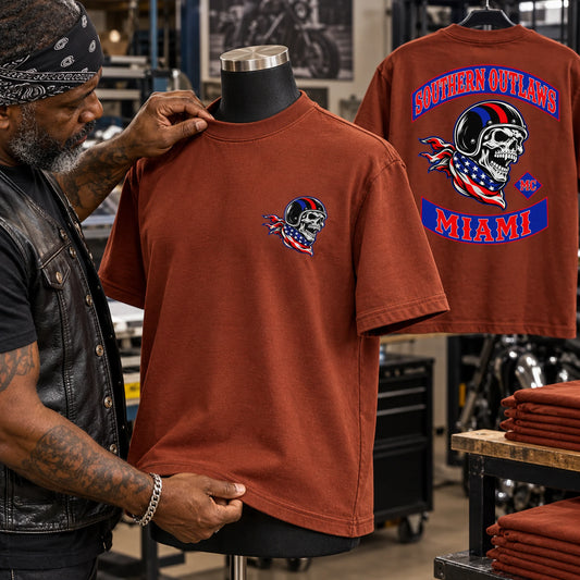 Southern Outlaws 207 GSM heavyweight club T-shirt inspected for dense cotton and reinforced construction.