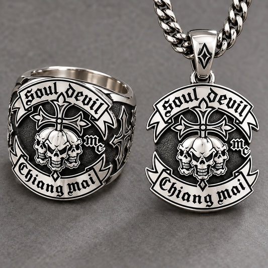 Sterling silver motorcycle club jewelry showing bright polished edges and darker recessed relief.