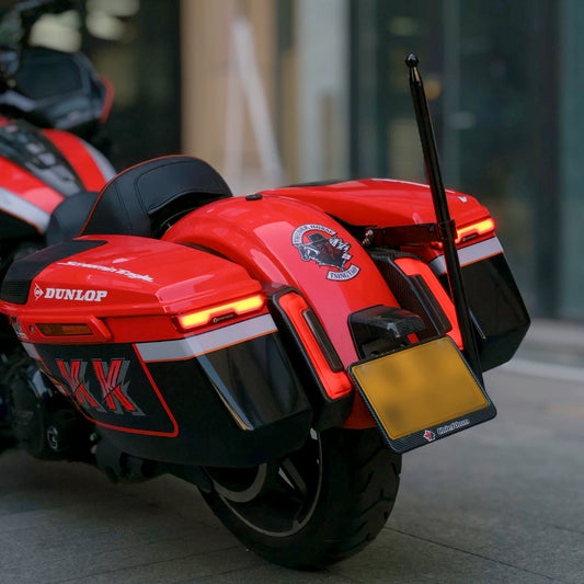 Sequential saddlebag lights on red Harley-Davidson Touring