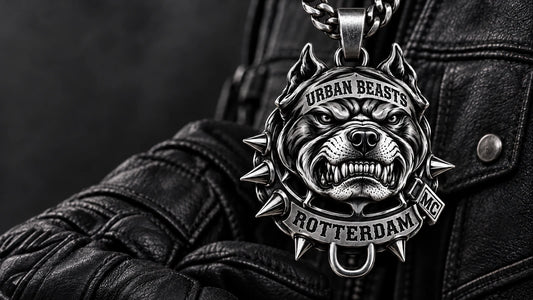 Urban Beasts custom stainless steel motorcycle club pendant displayed with dark leather riding gear for a quote consultation.