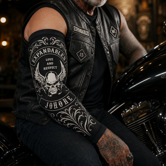 Large motorcycle club emblem centered on a removable full-coverage arm sleeve