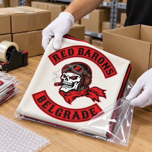 Finished custom motorcycle club exchange flag being packed for worldwide shipping.