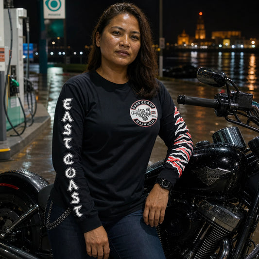 Custom motorcycle club long-sleeve shirt with chapter lettering printed along the sleeves.