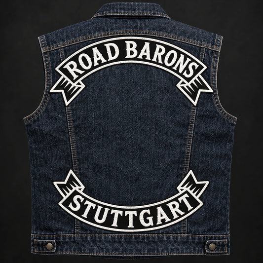 Complete denim motorcycle vest showing twill-base top and bottom rockers with embroidered lettering.