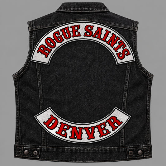 Complete black denim motorcycle vest displaying fine woven-detail top and bottom rocker patches.