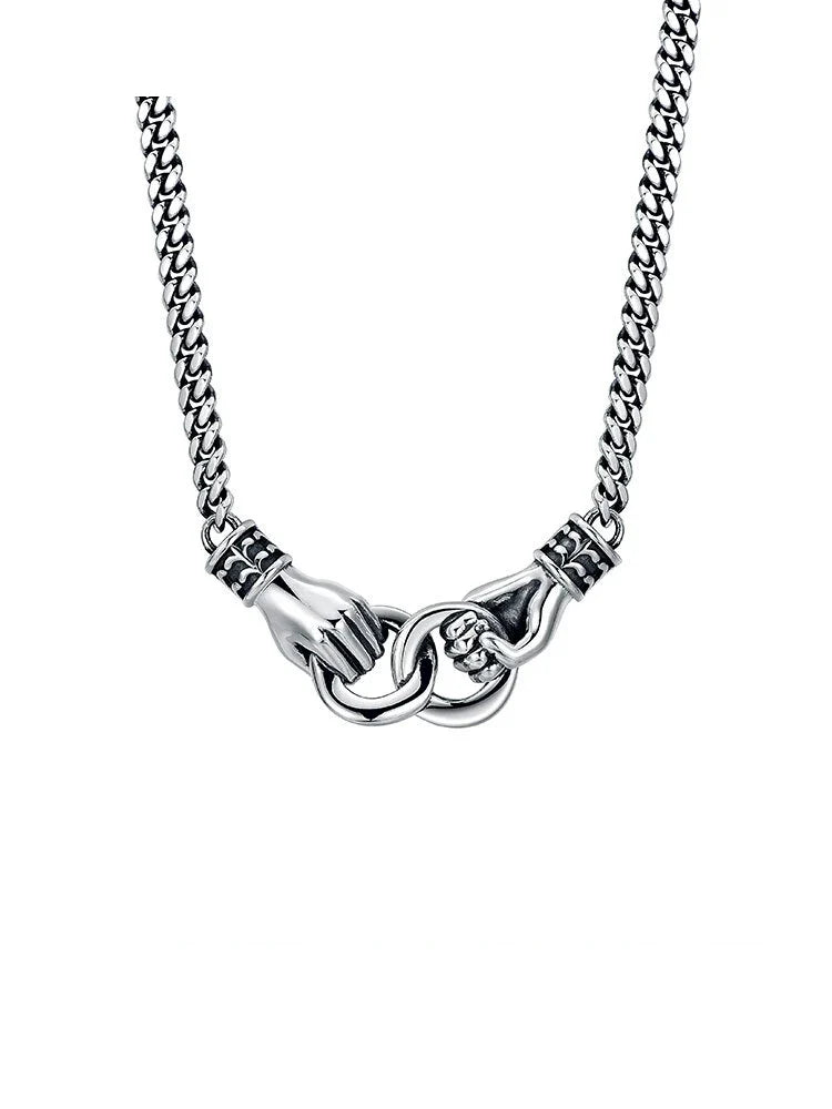 Handshake double-ring Cuban sterling-silver biker necklace featured in a necklace-types guide