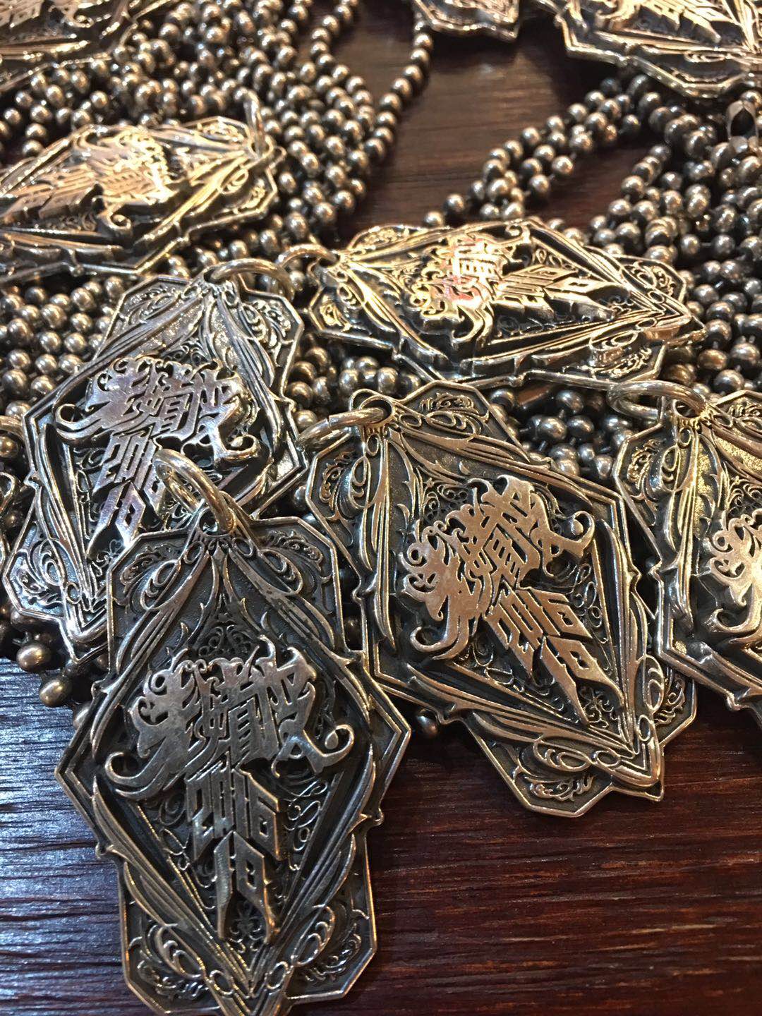 Unveiling the Meaning Behind Biker Pendants: Enhance Your Motorcycle Look
