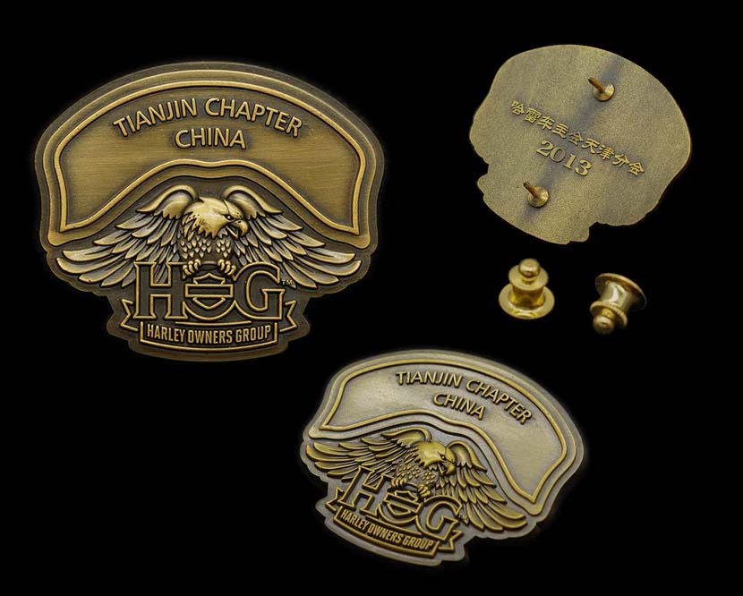 Exploring the Differences: 3D Lapel Pins vs. Die Struck Lapel Pins for Motorcycle Club Members