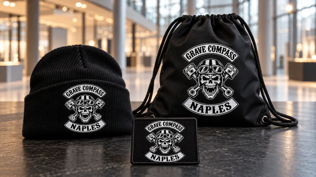 Grave Compass Naples motorcycle club visitor kit with logo beanie, drawstring bag and name bar prepared for a motorcycle show.