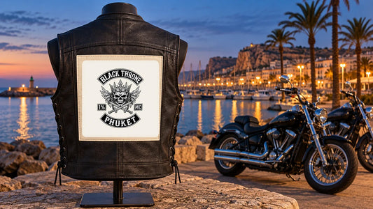 Black motorcycle club vest with an authorized full embroidered club badge at a Costa Blanca harbor turnout before the El Campello weekend.