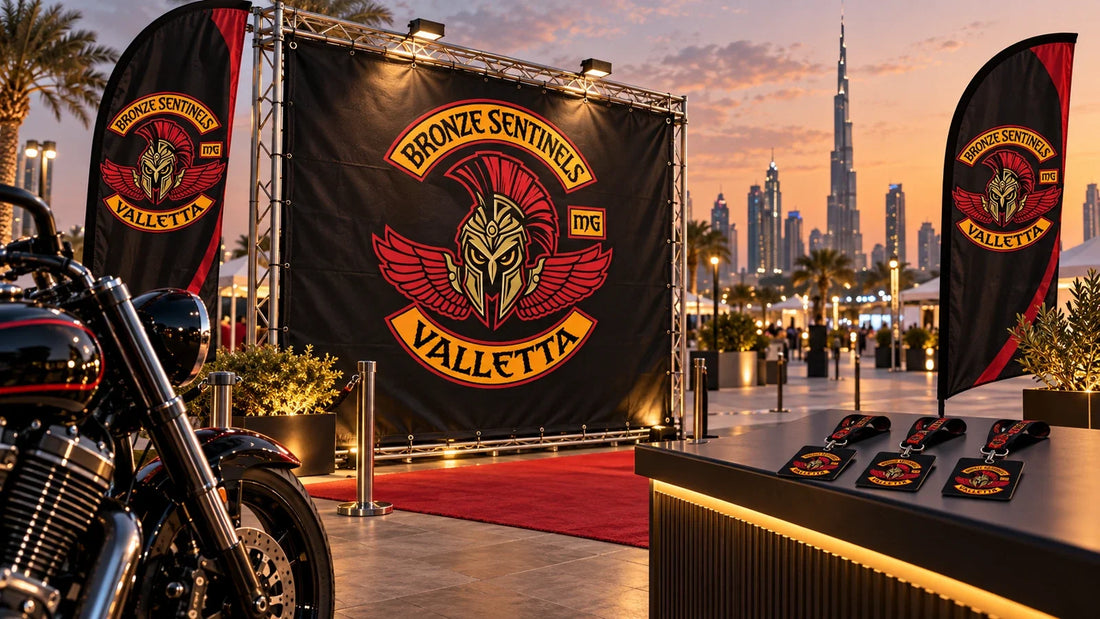 Bronze Sentinels Valletta motorcycle club welcome point with logo event gear at a modern Dubai exhibition venue.