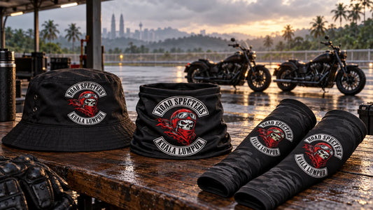 Road Specters Kuala Lumpur club gear staged beside parked V-twin motorcycles for a Sepang race-week arrival plan.