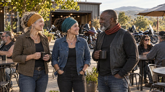 Three motorcycle riders wearing a headband, triangle wrap and short neck fold at an outdoor cafe with mature club riders and multiple unbranded heavyweight V-twin cruisers.