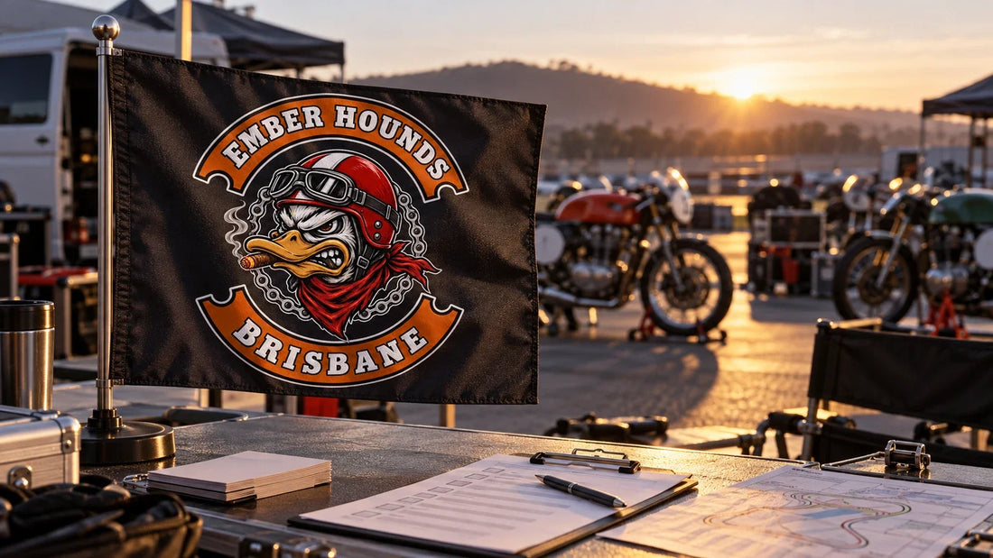 Private paddock planning board beside an Ember Hounds Brisbane rectangular motorcycle club flag.