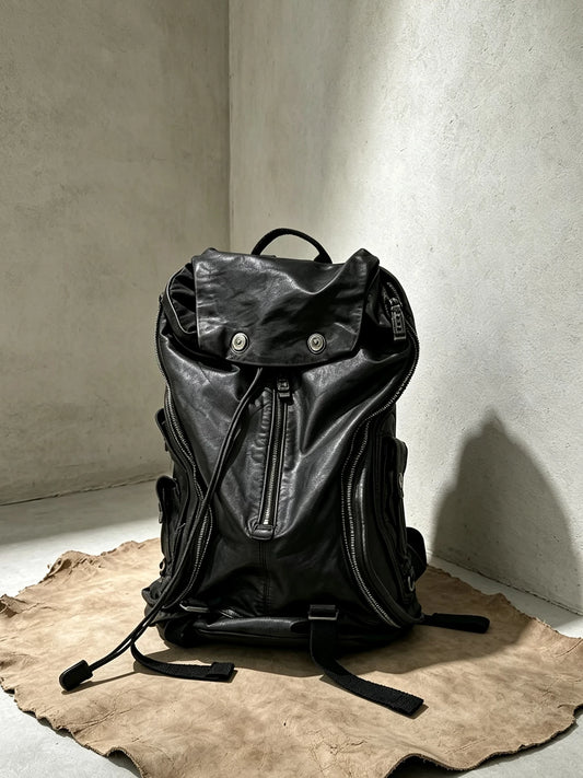 heavy-washed distressed leather backpack 1