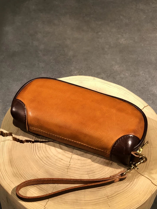 hand-distressed leather clutch bag 1