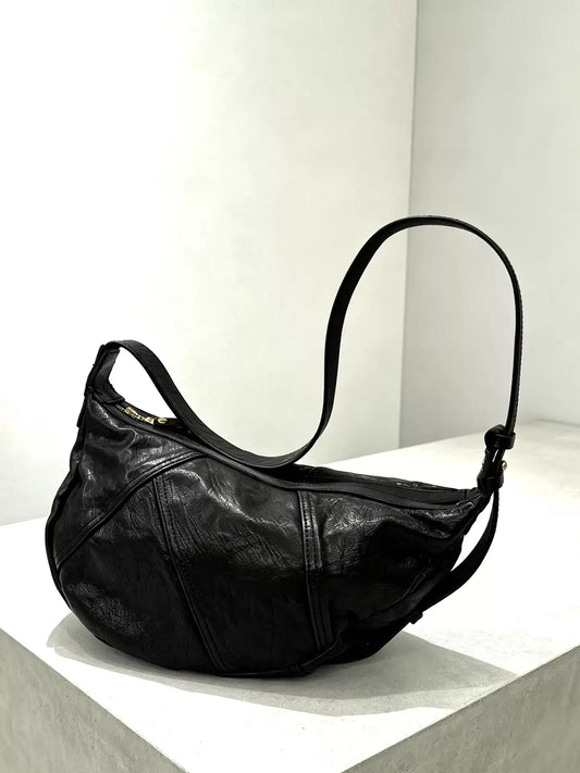 asymmetric vegetable-tanned horsehide bag 2