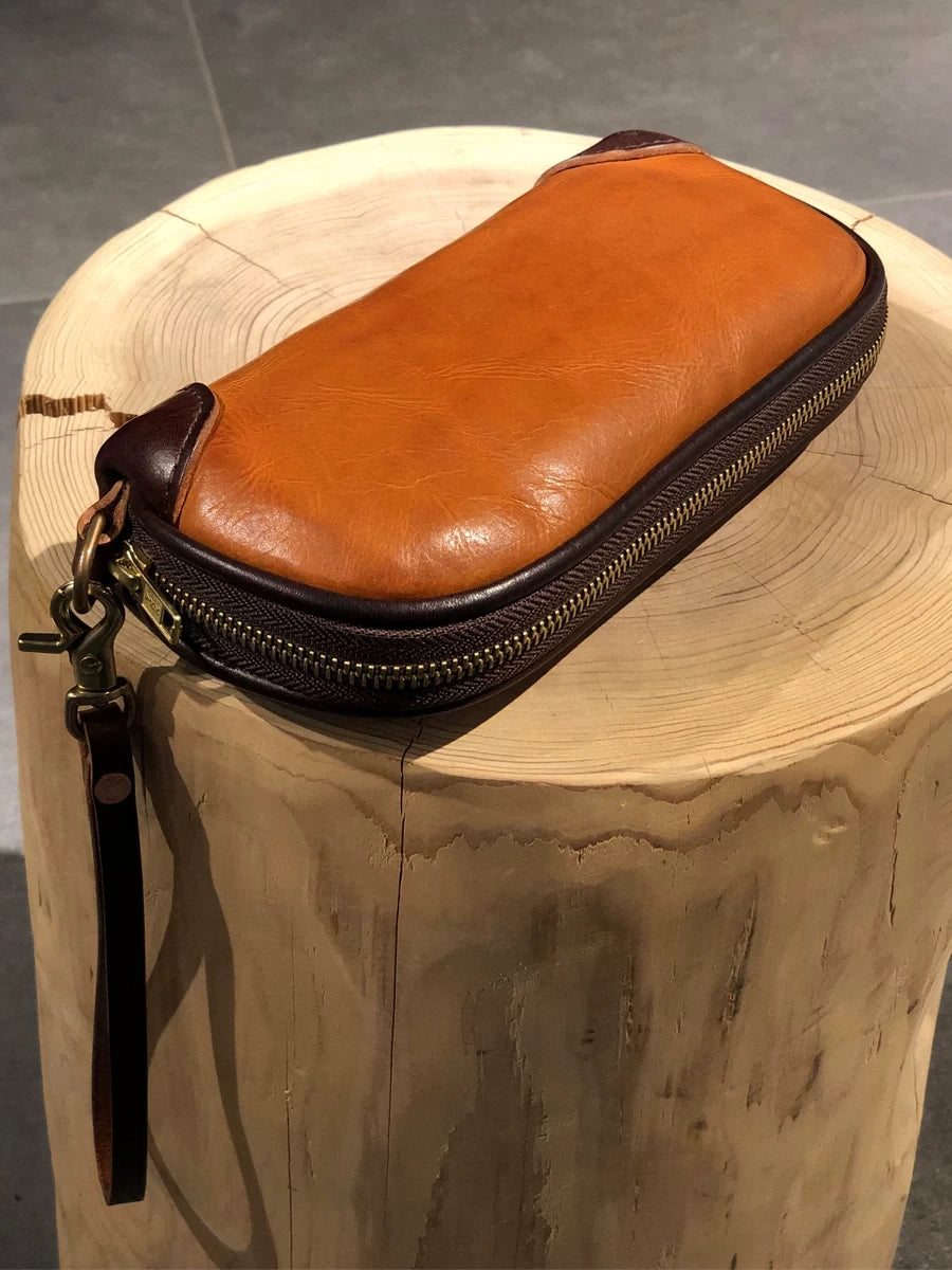 hand-distressed leather clutch bag 2