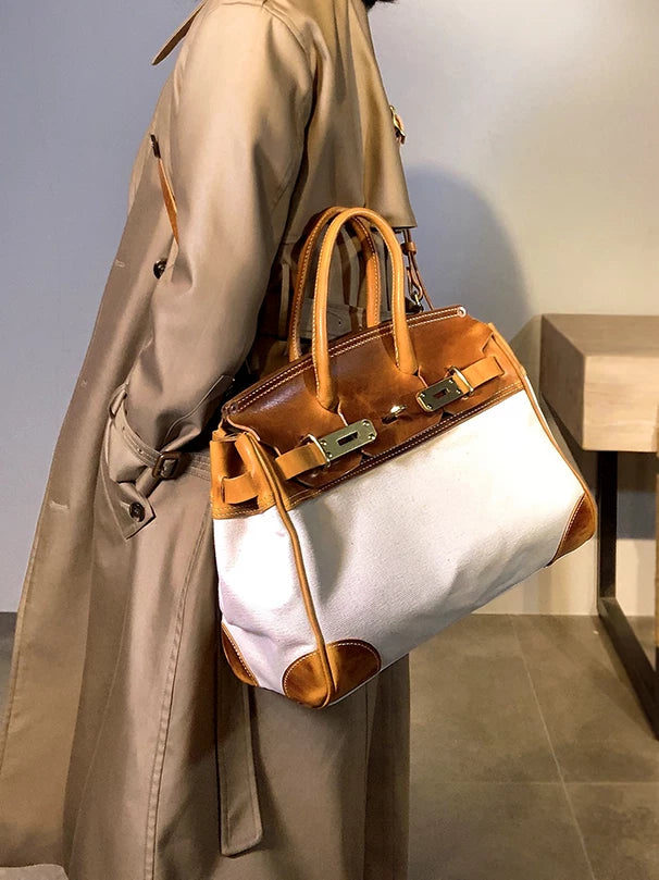 hand-stitched vegetable-tanned leather top-handle bag 2