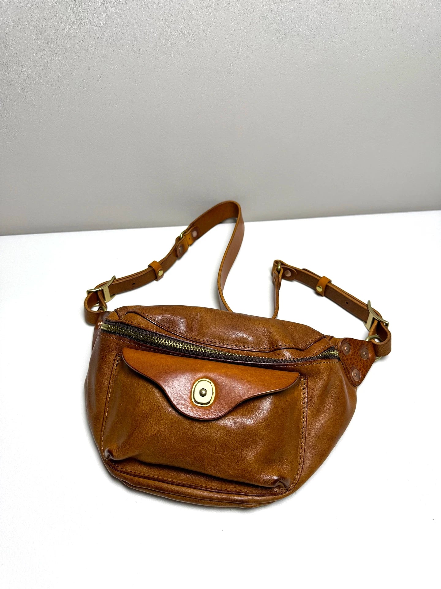 vegetable-tanned leather chest crossbody bag 2