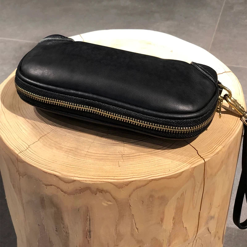 hand-distressed leather clutch bag 4