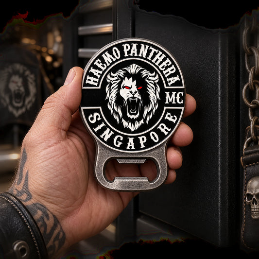Solid magnetic motorcycle club bottle opener attached to a clubhouse tool cabinet.