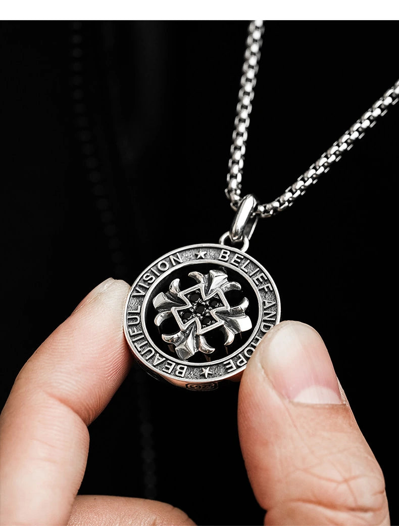 Rotating Fleur Cross Ring Sterling Silver Biker Pendant — lifestyle detail view 6