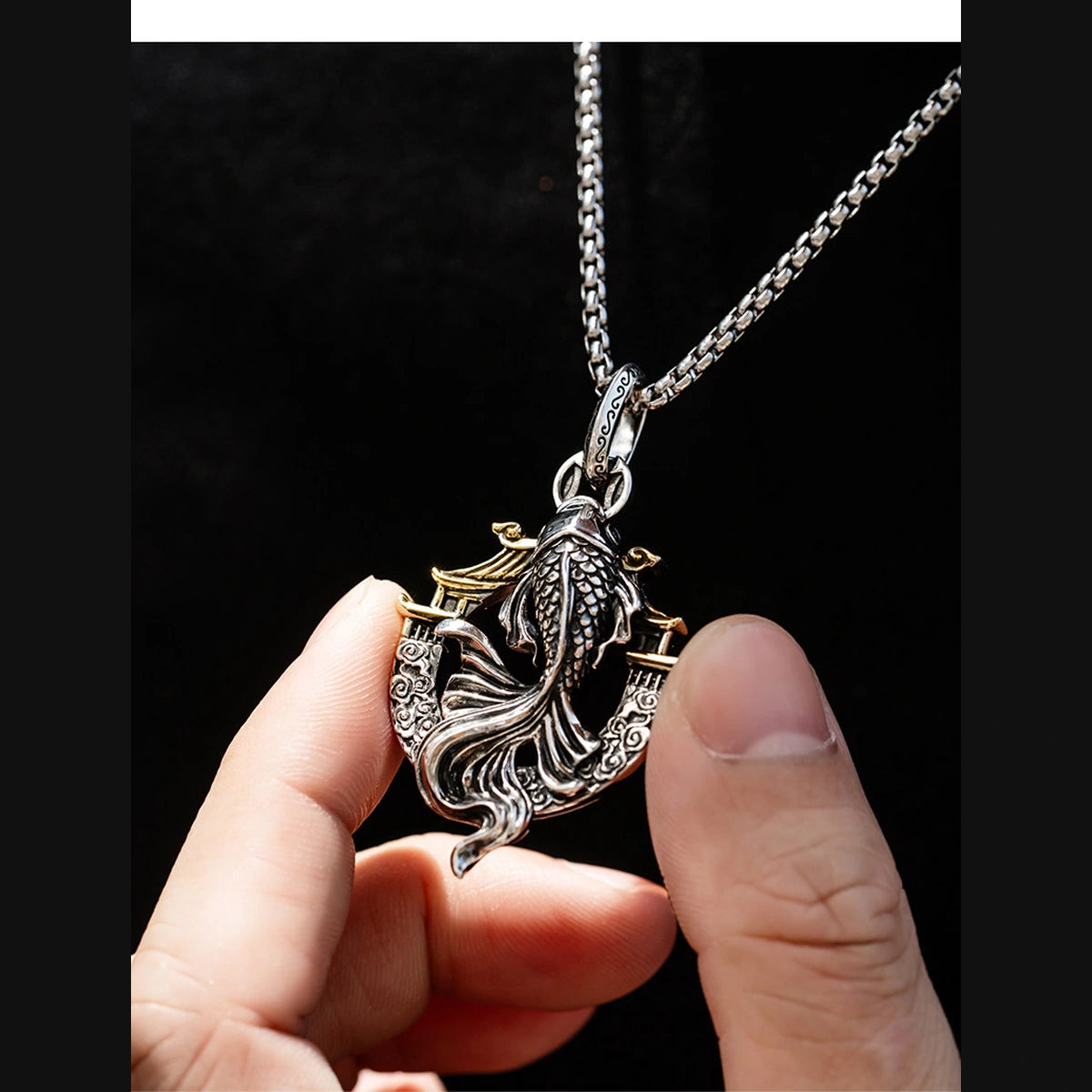 3D Koi Dragon Gate Sterling Silver Biker Pendant — handheld scale view