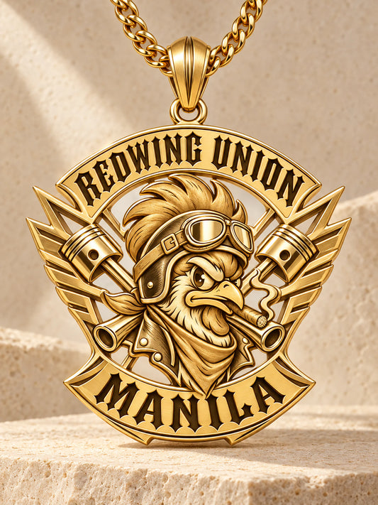 Satin sculpted solid 18K gold Redwing Union Manila motorcycle club pendant with an aerodynamic piston-wing silhouette and matching chain.