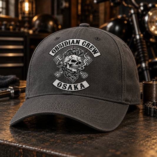 Custom charcoal motorcycle club baseball cap with a distinct authorized embroidered club logo.
