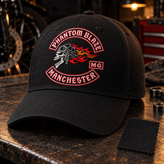 Phantom Blaze motorcycle club logo embroidered on a structured black cotton twill cap with a matching fabric swatch.