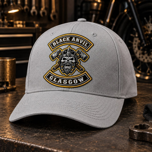Custom light grey motorcycle club baseball cap with a distinct authorized embroidered club logo.