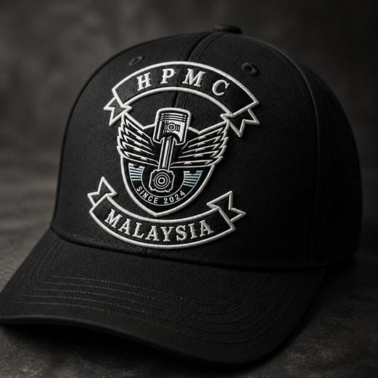 Macro view of raised 3D puff embroidery based on an authorized motorcycle club logo.