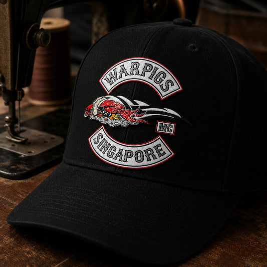 Traditional embroidered motorcycle club patch attached to a custom black baseball cap.