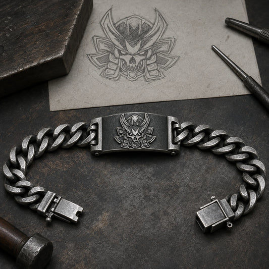 Enigma Malaysia samurai skull integrated into a curved silver bridge link on an open curb-chain bracelet