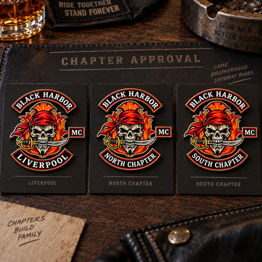 Three Black Harbor motorcycle club chapter pin versions using one consistent central club identity.