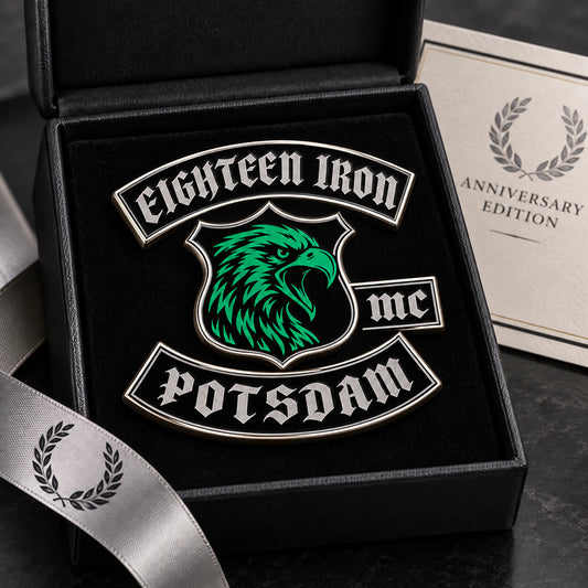 Eighteen Iron Potsdam motorcycle club anniversary enamel pin in a commemorative presentation box.