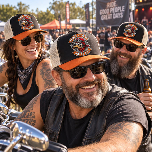 Motorcycle club rally crew wearing custom mesh-back caps with an authorized club logo.
