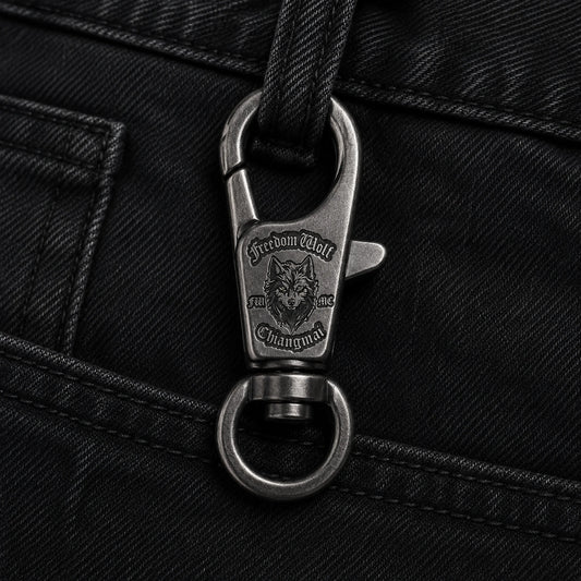 Lobster clasp attached to denim featuring an authorized motorcycle club logo.