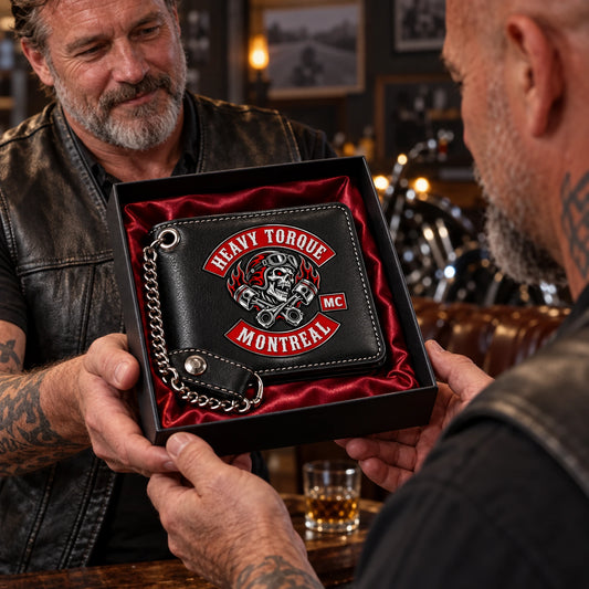 Heavy Torque Montreal motorcycle club officers presenting a premium leather wallet in a gift box.