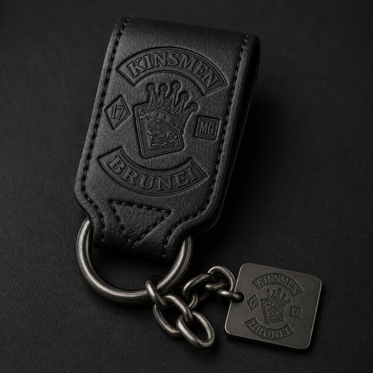 Black leather biker chain loop embossed with an authorized motorcycle club logo and connected to gunmetal hardware.