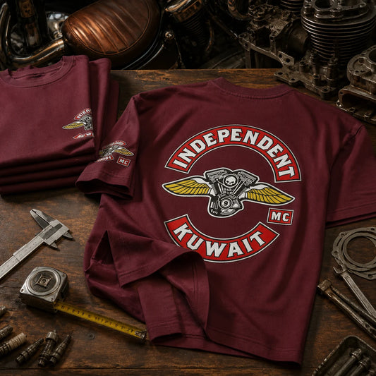 Independent MC Kuwait burgundy 250 GSM max-heavyweight short-sleeve club T-shirt shown in a structured layered garage flat lay.