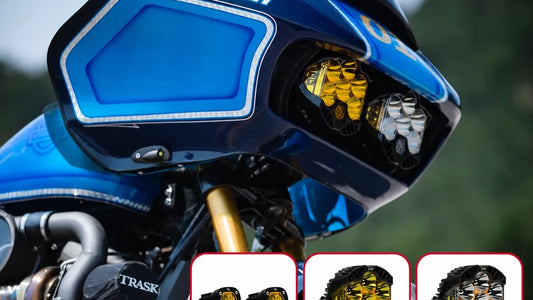 Motorcycle rider and mechanic reviewing lighting and control accessories for a V-twin motorcycle.