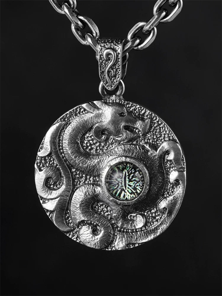 Ancestral Dragon eye sterling silver biker pendant worn on a chain