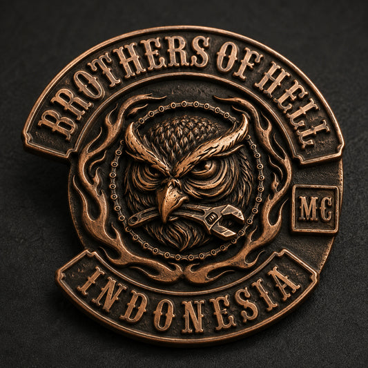 One-piece antique copper BROTHERS OF HELL club pin with deeply sculpted owl feathers and dark recessed patina.
