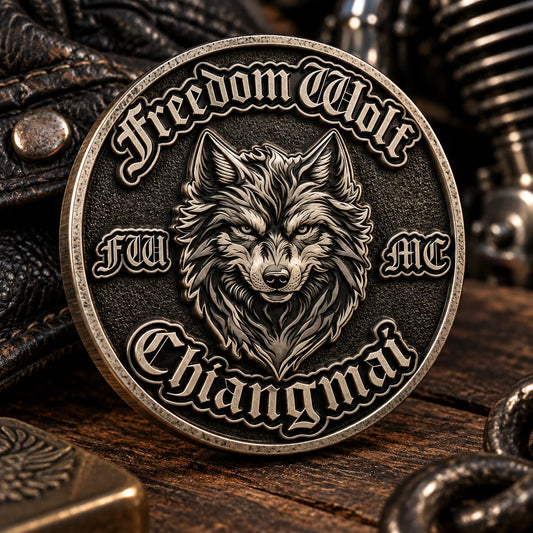 Antique silver motorcycle club challenge coin with deep sculpted metal relief.