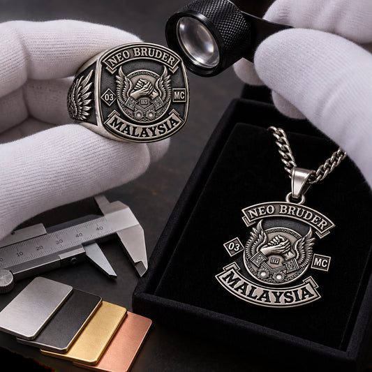 Custom motorcycle club jewelry sample being checked for logo accuracy, finish and personalization.