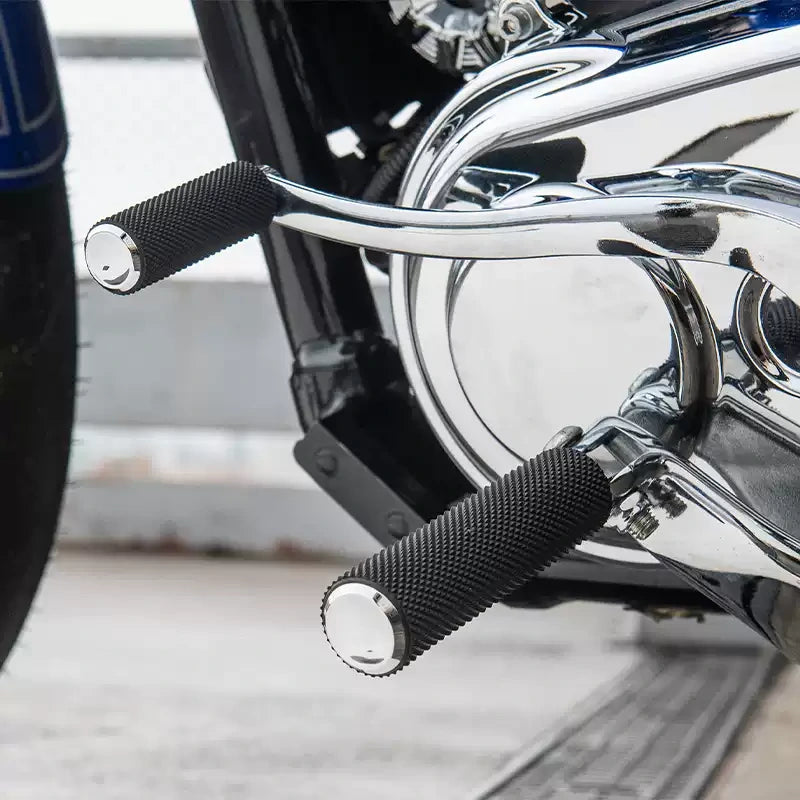 Arlen Ness chrome knurled foot pegs on harley