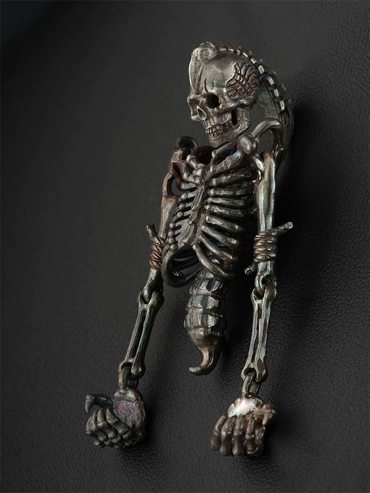 Movable skeleton gothic silver pendant angled view