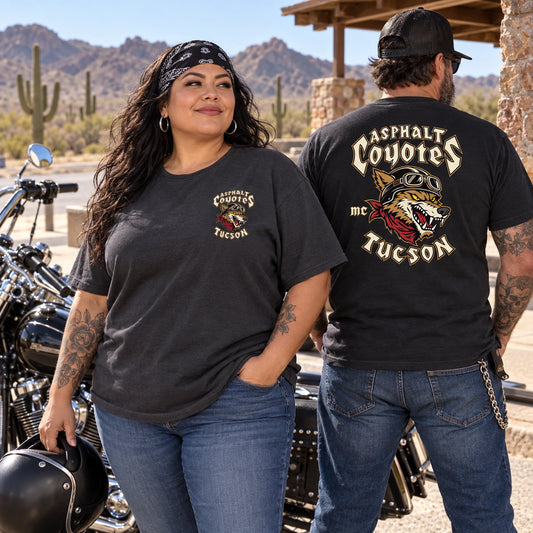 Asphalt Coyotes riders wearing roomy relaxed-fit club T-shirts at a desert rest stop.